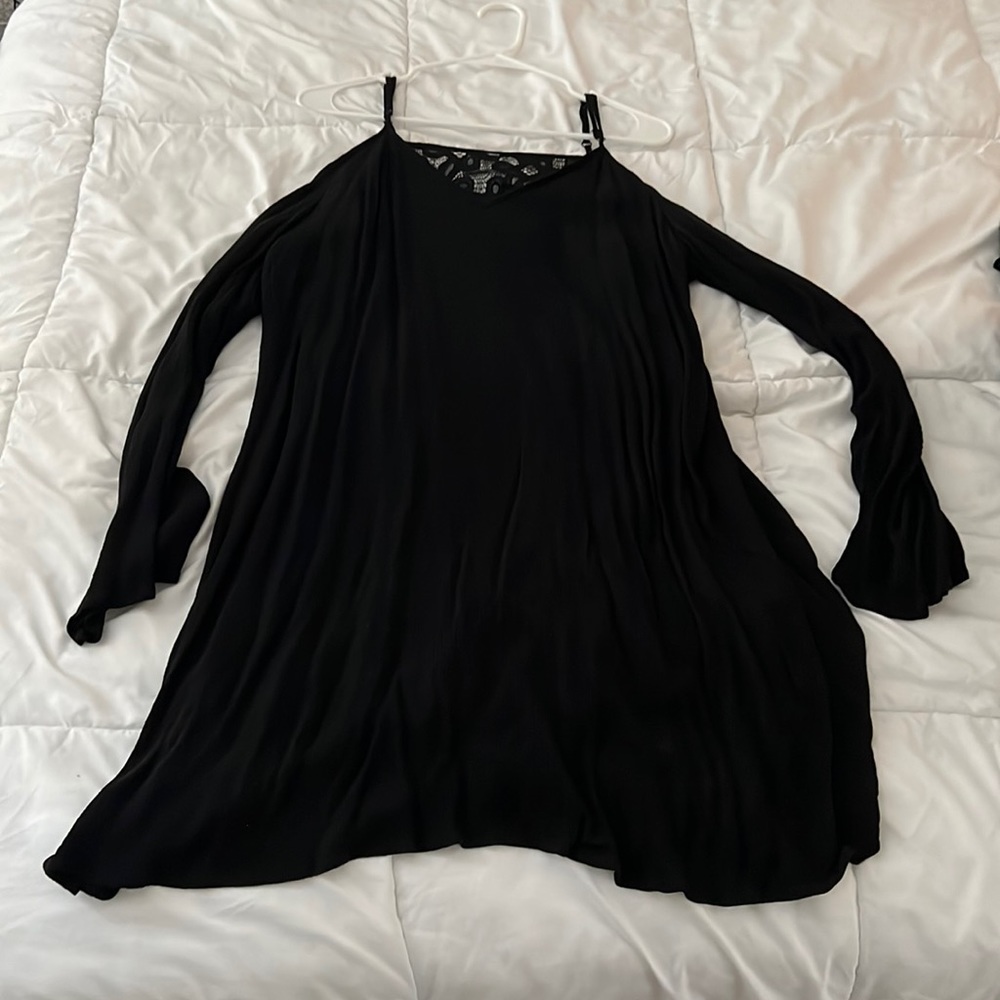 Black, mid length, shoulder cut out, long sleeve dress with V shaped lace back.